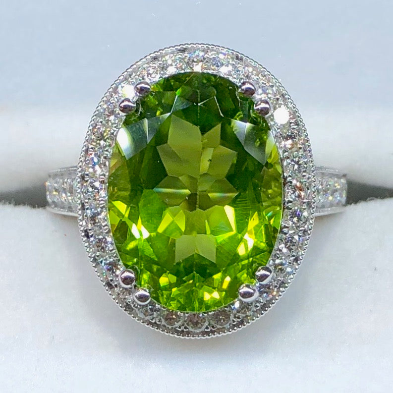 Emerald Cut Peridot, Diamond Halo Ring - Underwoods Jewelers